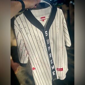 Supreme Jersey SZ Large lightly hand painted with spray paint by an artist.